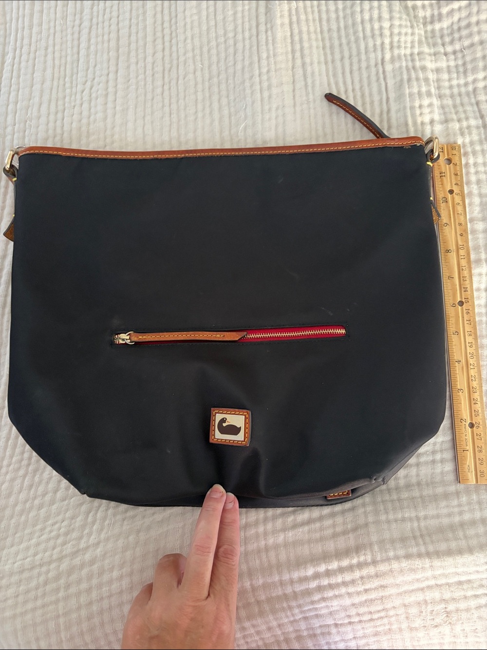 Dooney & Bourke Black Shoulder Bag with Brown Trim and Red Zipper